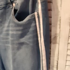 Torrid jeggings white stripes on legs size 20